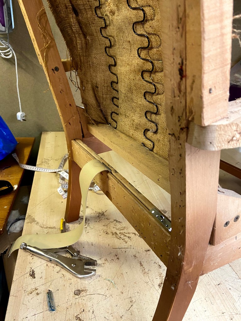 Stripped Frame and Pirelli webbing being installed